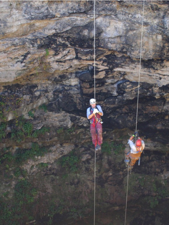 Photo of cavers ascending out of Devil's Sinkhole, Texas.