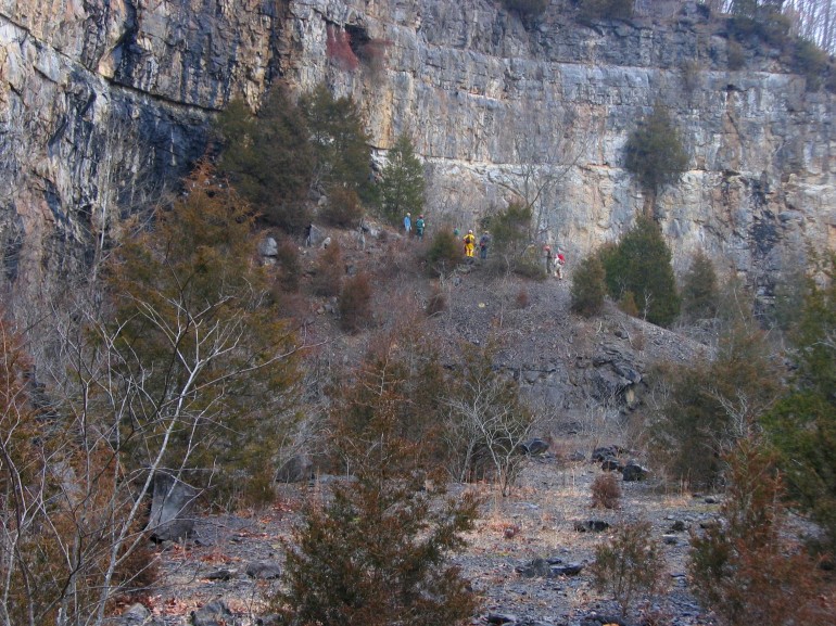 Scree slope leading up quarry wall to Bone Cave entrance.
